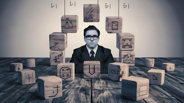 man-wooden-cubes-table-management-concept_926199-3775720